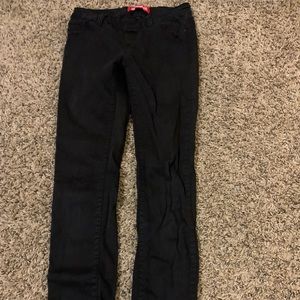 black mid rise jeans.
